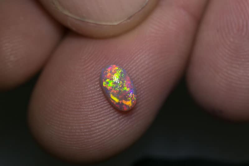 0.63 ct dark opal 7x4x2.5mm - Image 2