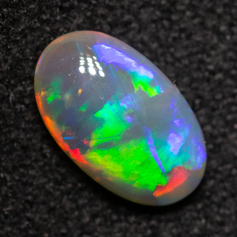 0.63 ct double-sided dark crystal opal 7.9x4.8x2.6mm - Image 4