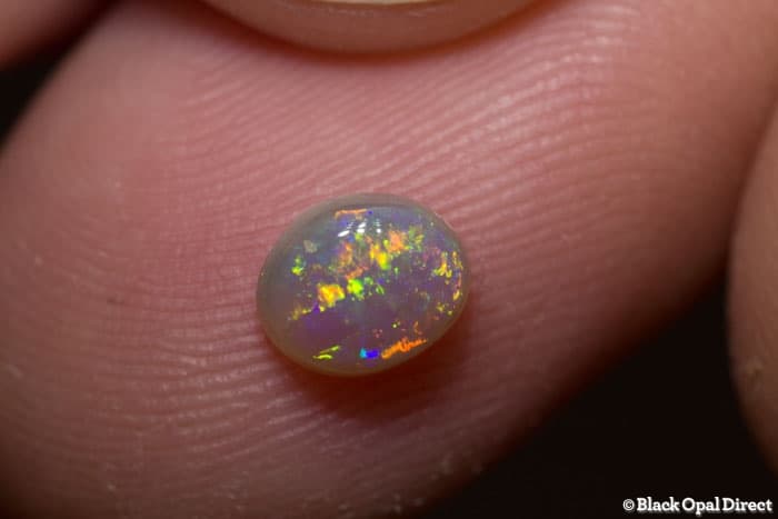0.63 ct semi black opal 6.5x5x3mm - Image 3