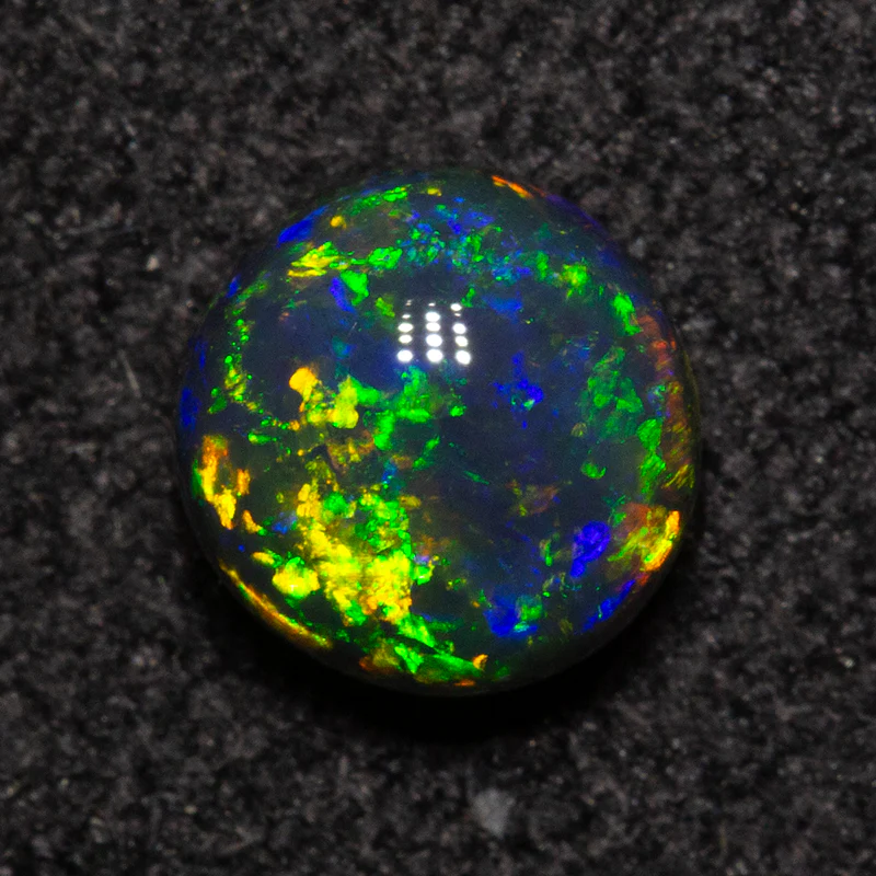 0.64 ct black opal 5.3x5.2x3.4mm - Image 2