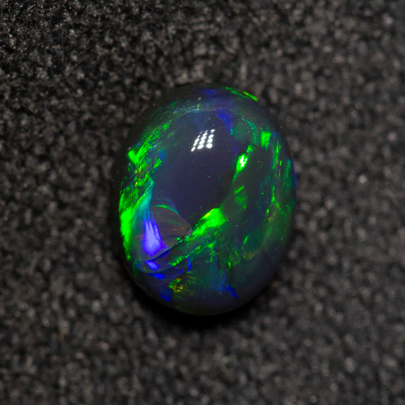 0.64 ct black opal 6.4x5x3.3mm - Image 2
