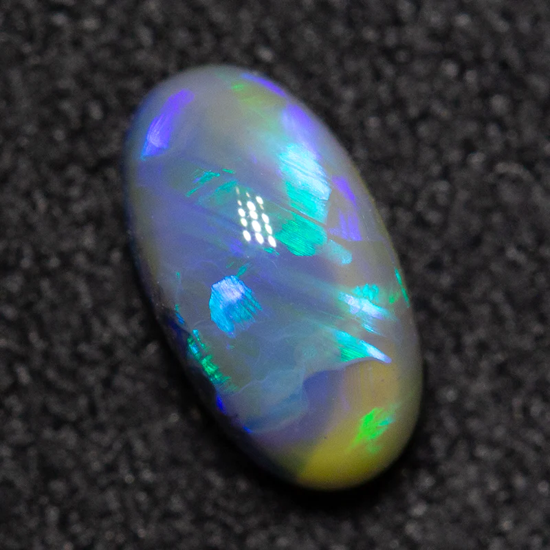 0.64 ct black opal 6.9x3.8x3.7mm - Image 2