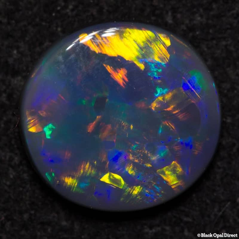 0.64 ct black opal 7x6.5x2mm - Image 2