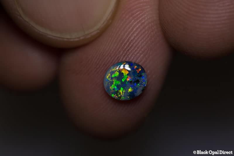 0.64 ct dark opal 7x6x2mm - Image 2