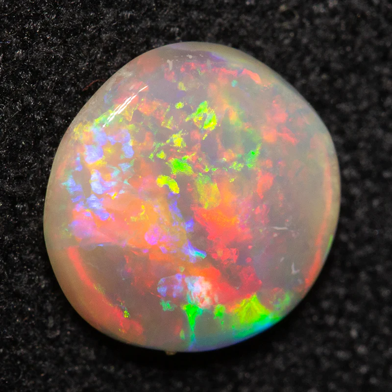 0.64 ct white opal 6.8x6.8x2mm - Image 2