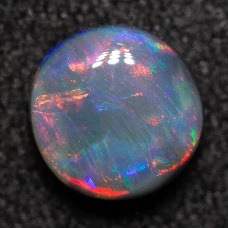 0.65 ct black opal 5.6x5.5x3.1mm - Image 2