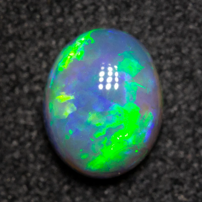 0.65 ct black opal 6.1x5x3.5mm - Image 2