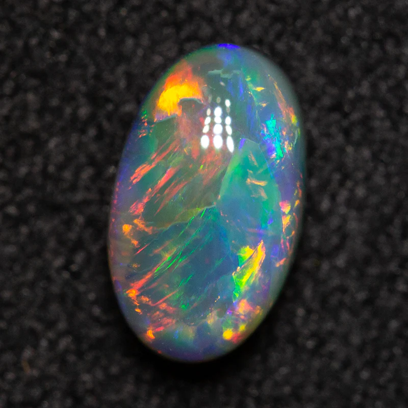 0.65 ct black opal 7.1x4.2x3.3mm - Image 3