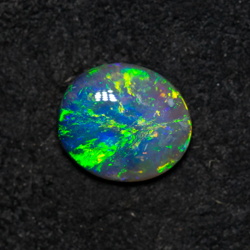 0.65 ct black opal 7.1x6.2x2.5mm - Image 3