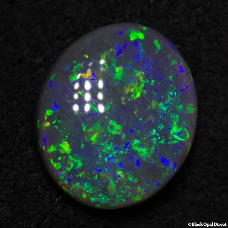 0.65 ct black opal 7x6x2mm - Image 2