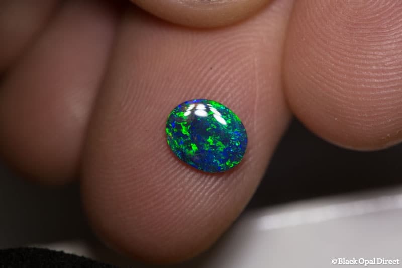 0.65 ct black opal 8x6.5x2mm - Image 2