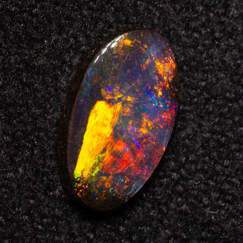 0.65 ct boulder opal 7.6x4.2x1.8mm - Image 2