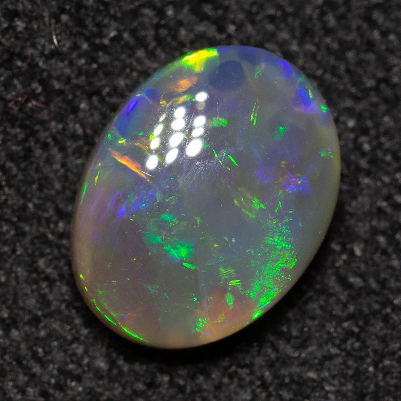 0.65 ct crystal opal 7x5.4x2.8mm - Image 2