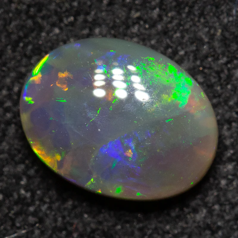 0.65 ct crystal opal 7x5.4x2.8mm - Image 3
