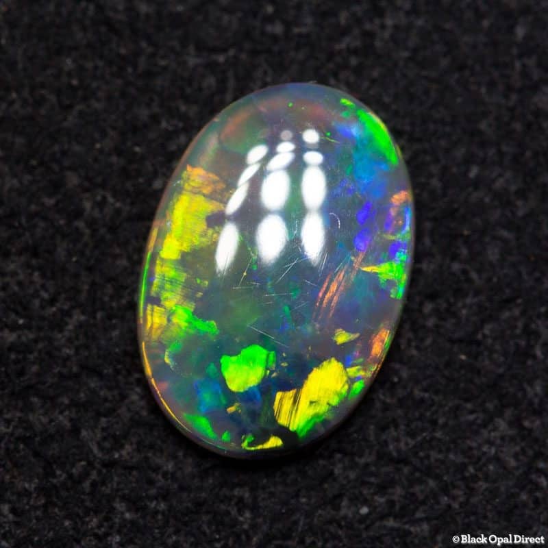0.65 ct dark crystal opal 8x6x1.5mm - Image 2