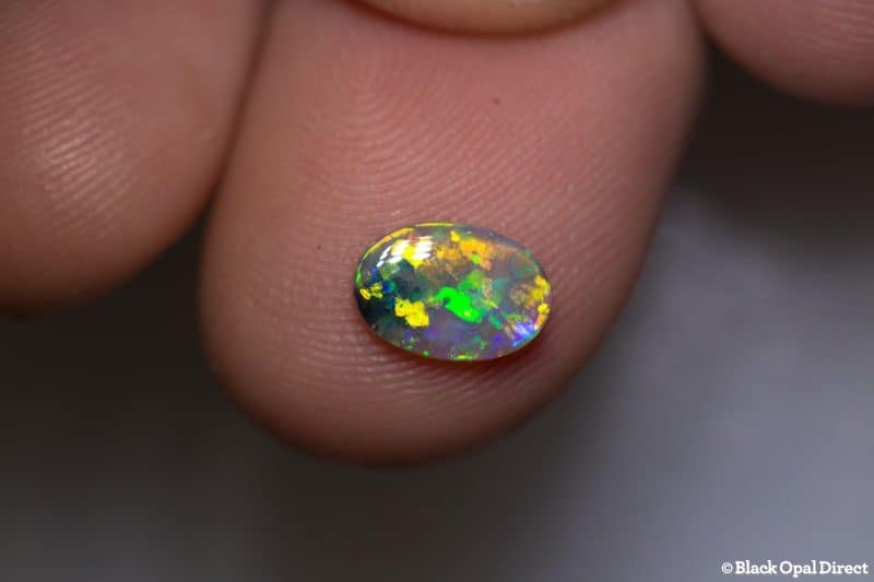 0.65 ct dark crystal opal 8x6x1.5mm - Image 3