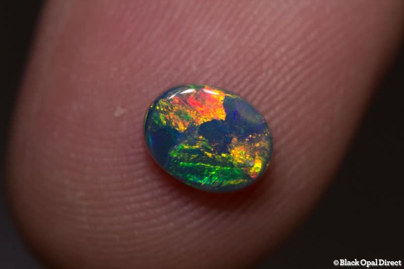 0.65 ct semi black opal 7x5.3x2.1 - Image 2