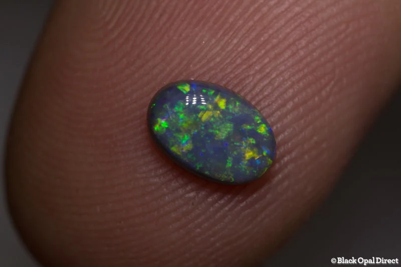 0.65 ct semi black opal 7x5x2.5mm - Image 2