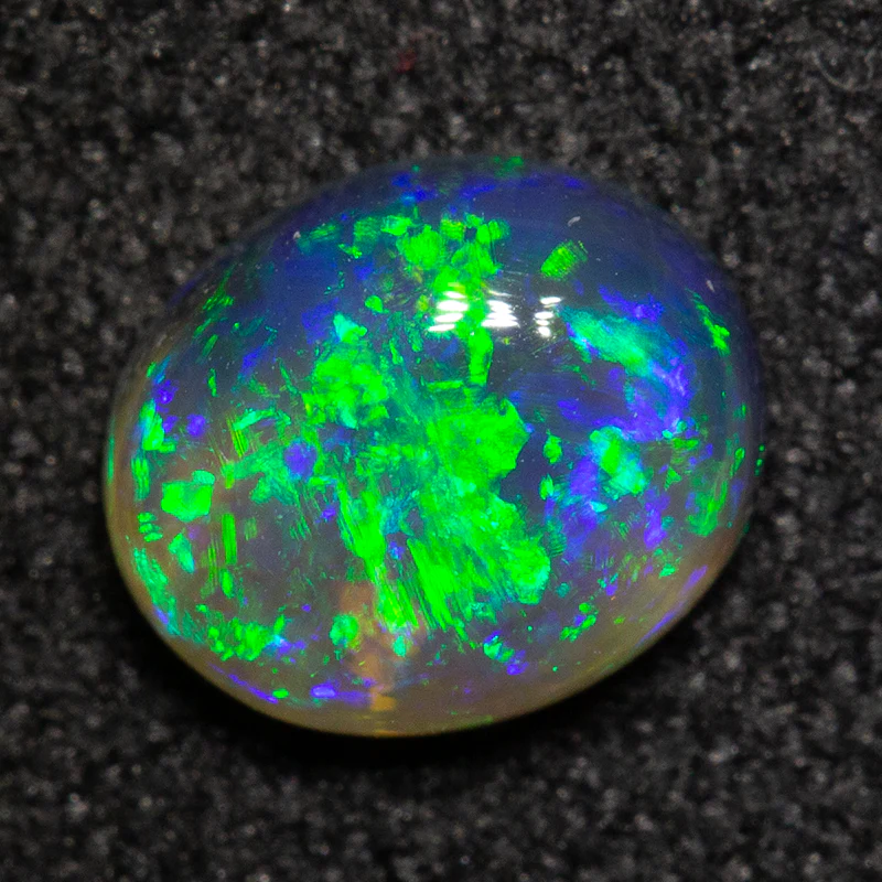 0.66 ct black crystal opal 6.5x5.4x2.9mm - Image 2