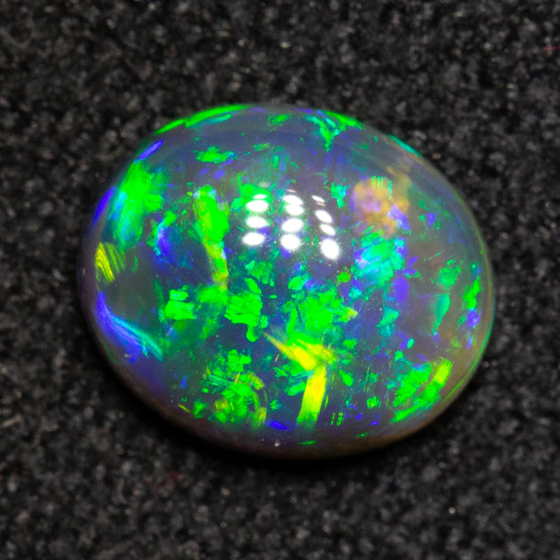 0.66 ct black crystal opal 6.5x5.4x2.9mm - Image 3