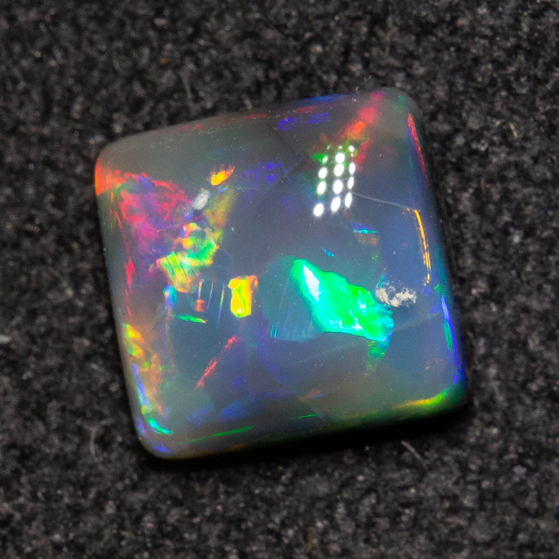 0.66 ct black opal 5.5x5.3x2.8mm - Image 3