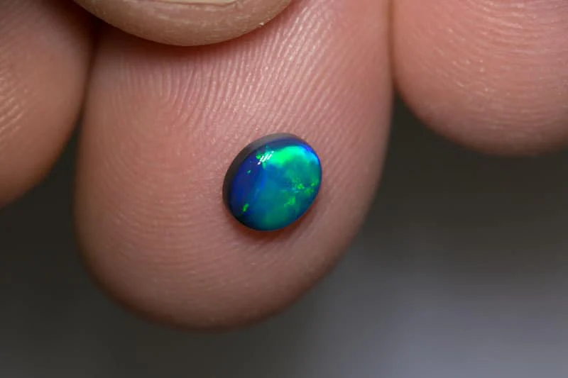0.66 ct black opal 6x5x2.5mm - Image 2