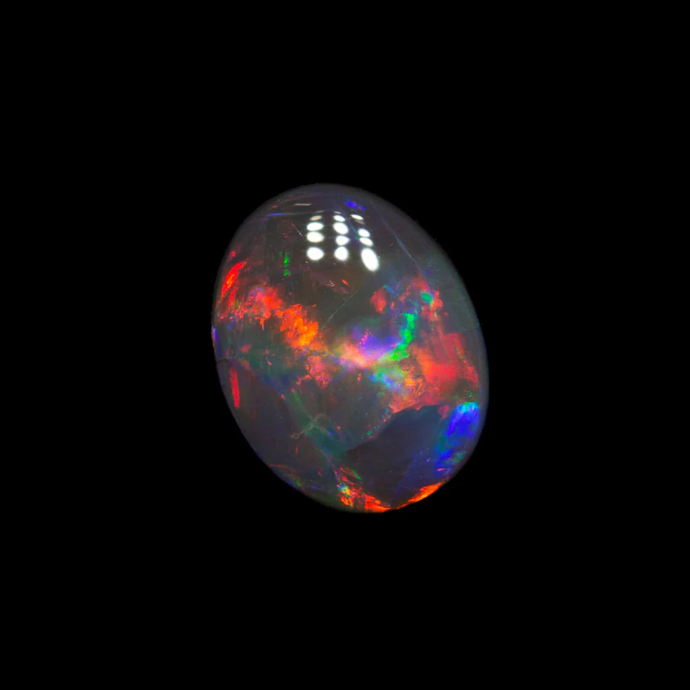 0.66 ct black opal 7.1x5.7x2.4mm - Image 2