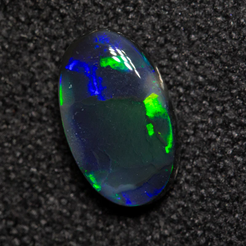 0.66 ct black opal 7.7x4.7x2.5mm - Image 2