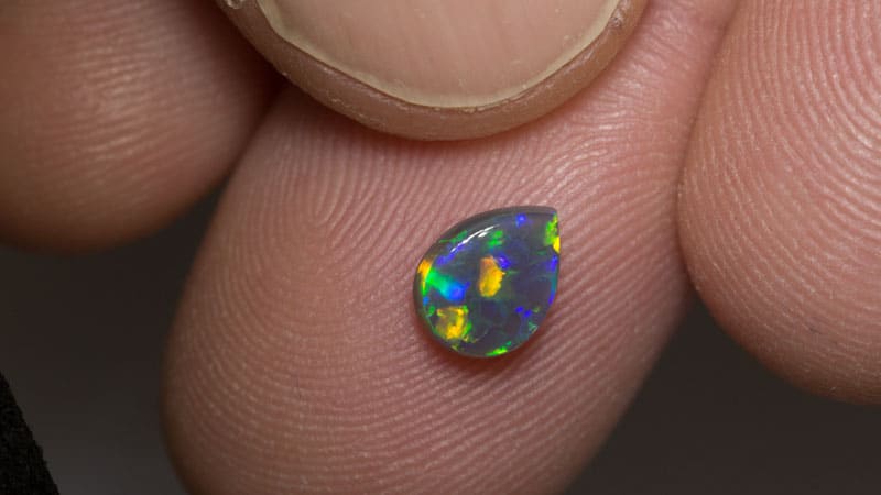 0.66 ct black opal 7x5x2mm - Image 2