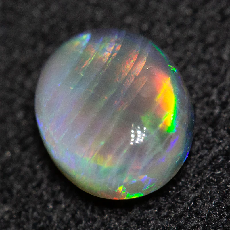 0.66 ct dark opal 6.2x5.2x3.1mm - Image 2