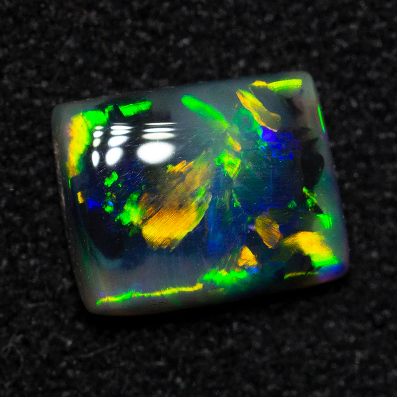 0.66 ct dark opal 6.3x5.1x2.4mm - Image 2