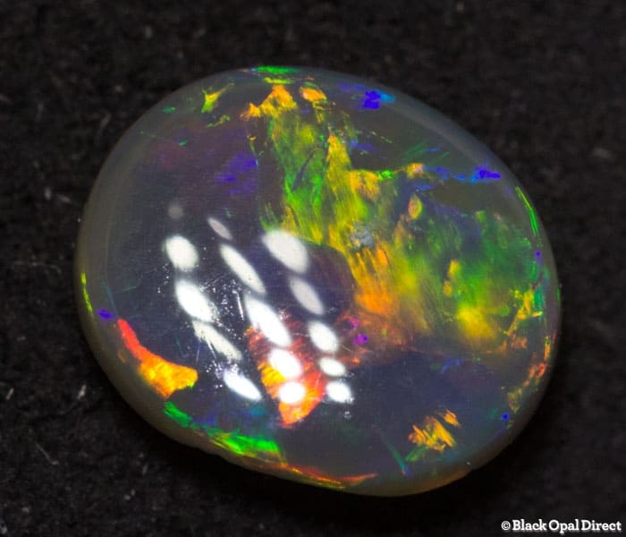 0.66 ct semi black opal 7x6x2.5mm - Image 2