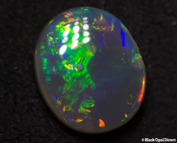 0.66 ct semi black opal 7x6x2.5mm - Image 3