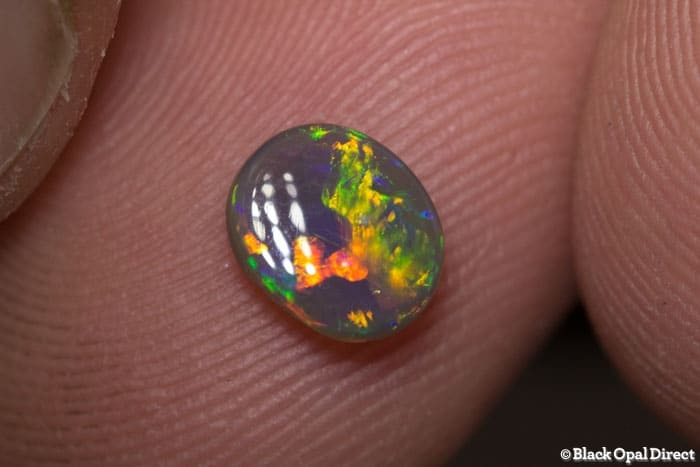 0.66 ct semi black opal 7x6x2.5mm - Image 4