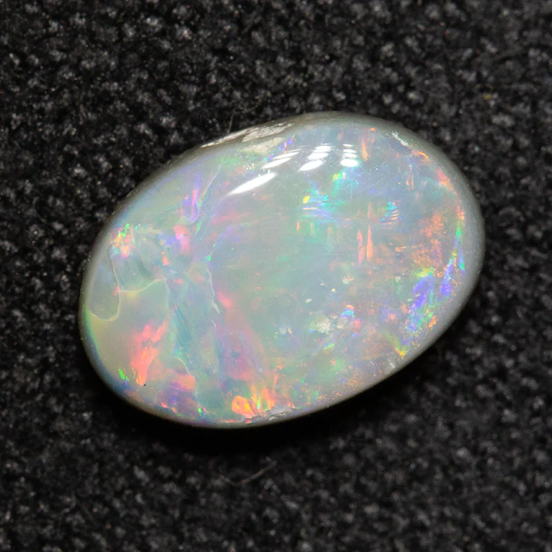 0.66 ct white opal 7.7x5.3x2.5mm - Image 2