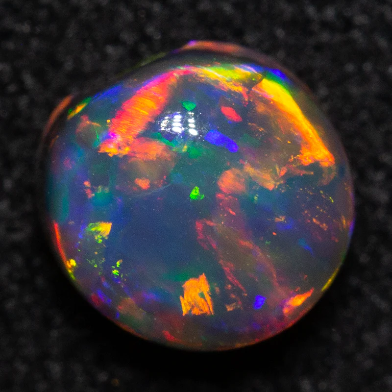 0.67 ct black opal 5.6x5.2x3.7mm - Image 3