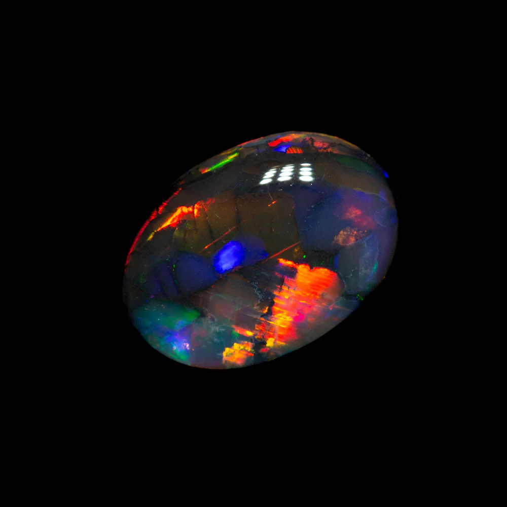 0.67 ct black opal 7.7x5.4x2.5mm - Image 3