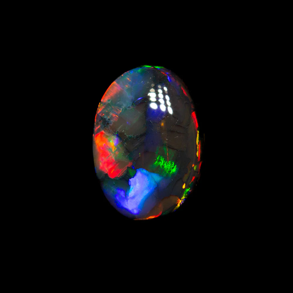 0.67 ct black opal 7.7x5.4x2.5mm - Image 4