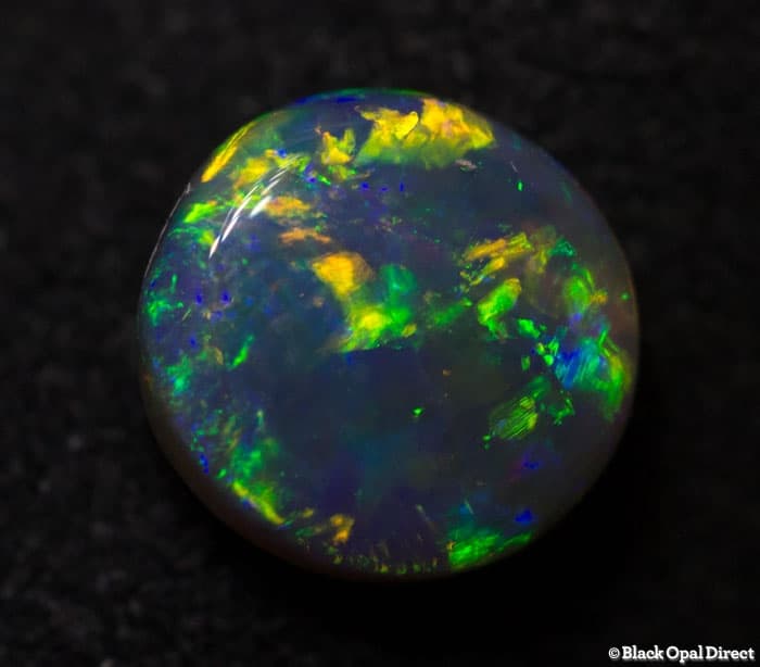 0.67 ct crystal opal 6mm round x2.5mm thick - Image 2