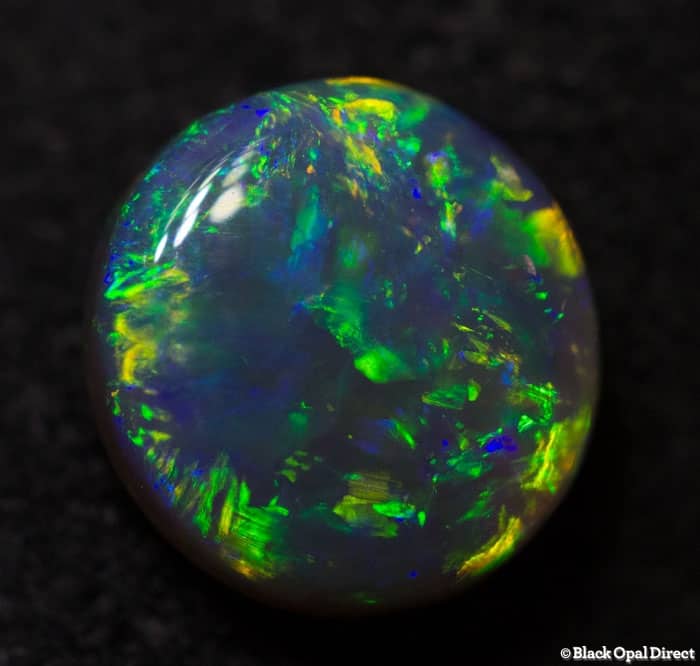 0.67 ct crystal opal 6mm round x2.5mm thick - Image 3
