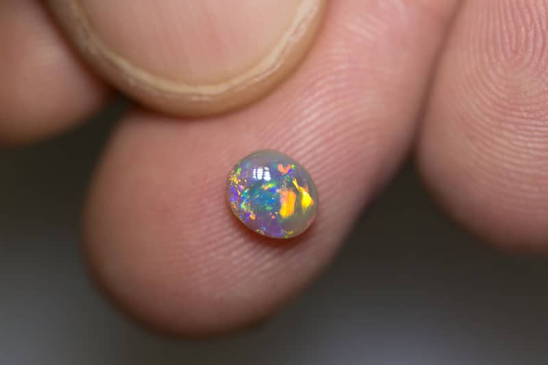 0.67 ct dark crystal opal 6x5x3mm - Image 2