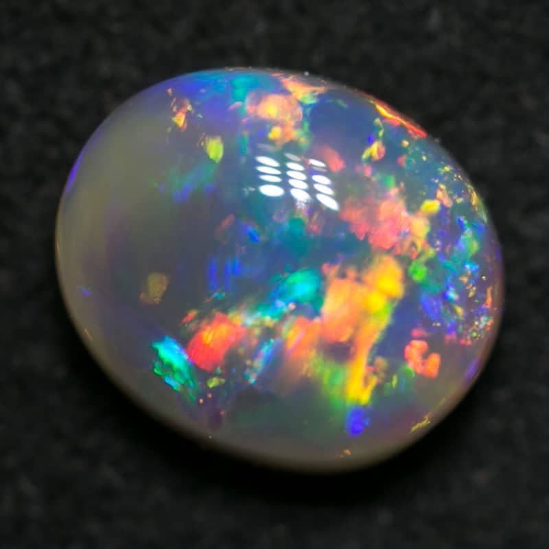 0.67 ct dark crystal opal 6x5x3mm - Image 3