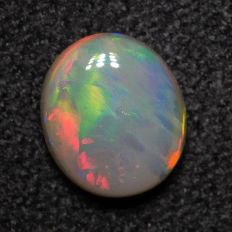 0.67 ct dark opal 6.4x5.5x2.7mm - Image 2