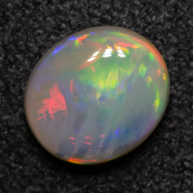 0.67 ct dark opal 6.4x5.5x2.7mm - Image 3