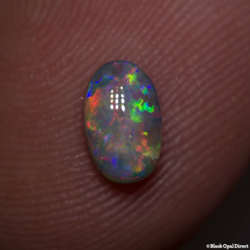 0.67 ct semi black opal 7x4x3mm - Image 2