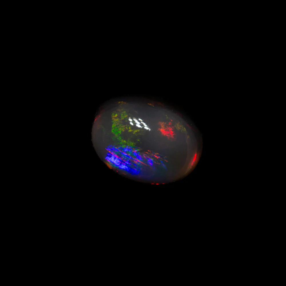 0.68 ct black opal 6.3x4.7x3.2mm - Image 2