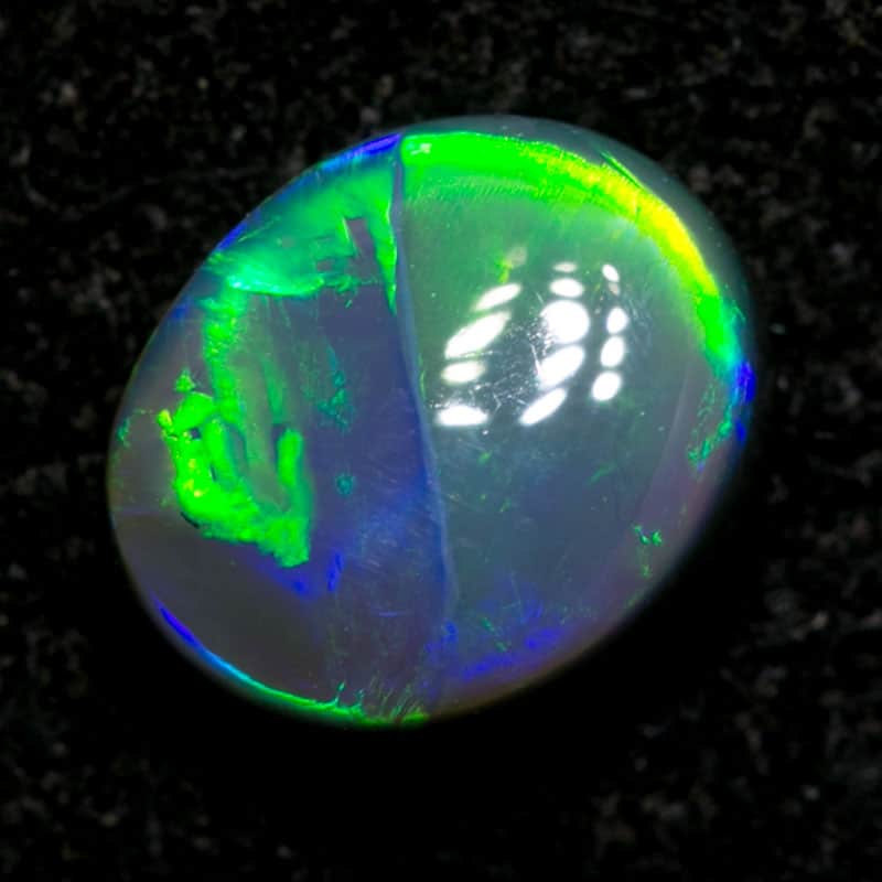 0.68 ct black opal 6.3x5.3x3mm - Image 3