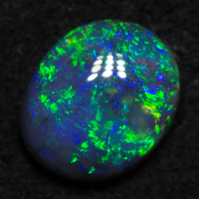 0.68 ct black opal 6.5x5x2.5mm - Image 2
