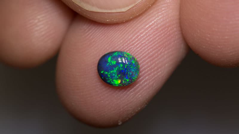 0.68 ct black opal 6.5x5x2.5mm - Image 3