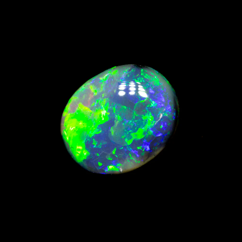 0.68 ct black opal 7.1x5.8x2.7mm - Image 2